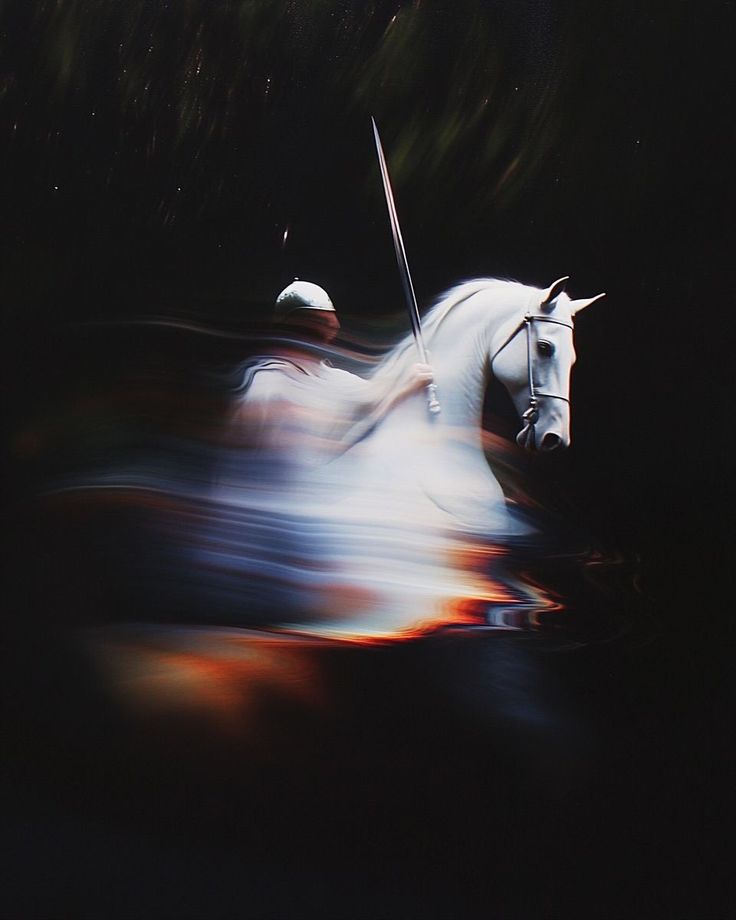 A pale rider on a white horse charging through dark water in motion blur
